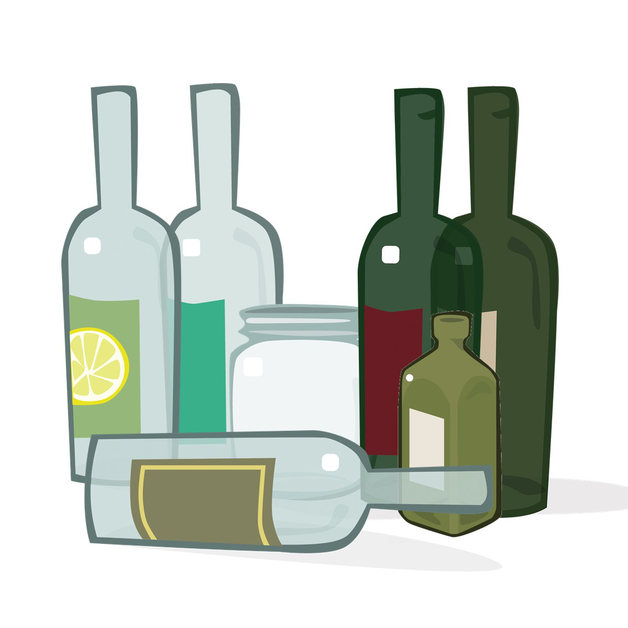 Gruppbild på glasförpackningar; flaskor och burkar i ofärgat och färgat glas.
